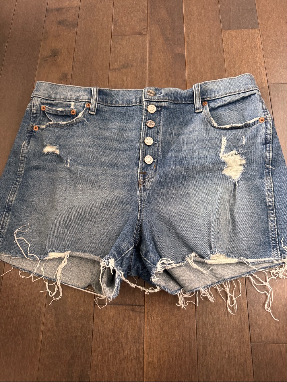 GAP Distressed Button-Fly Denim Shorts in Light Blue Wash